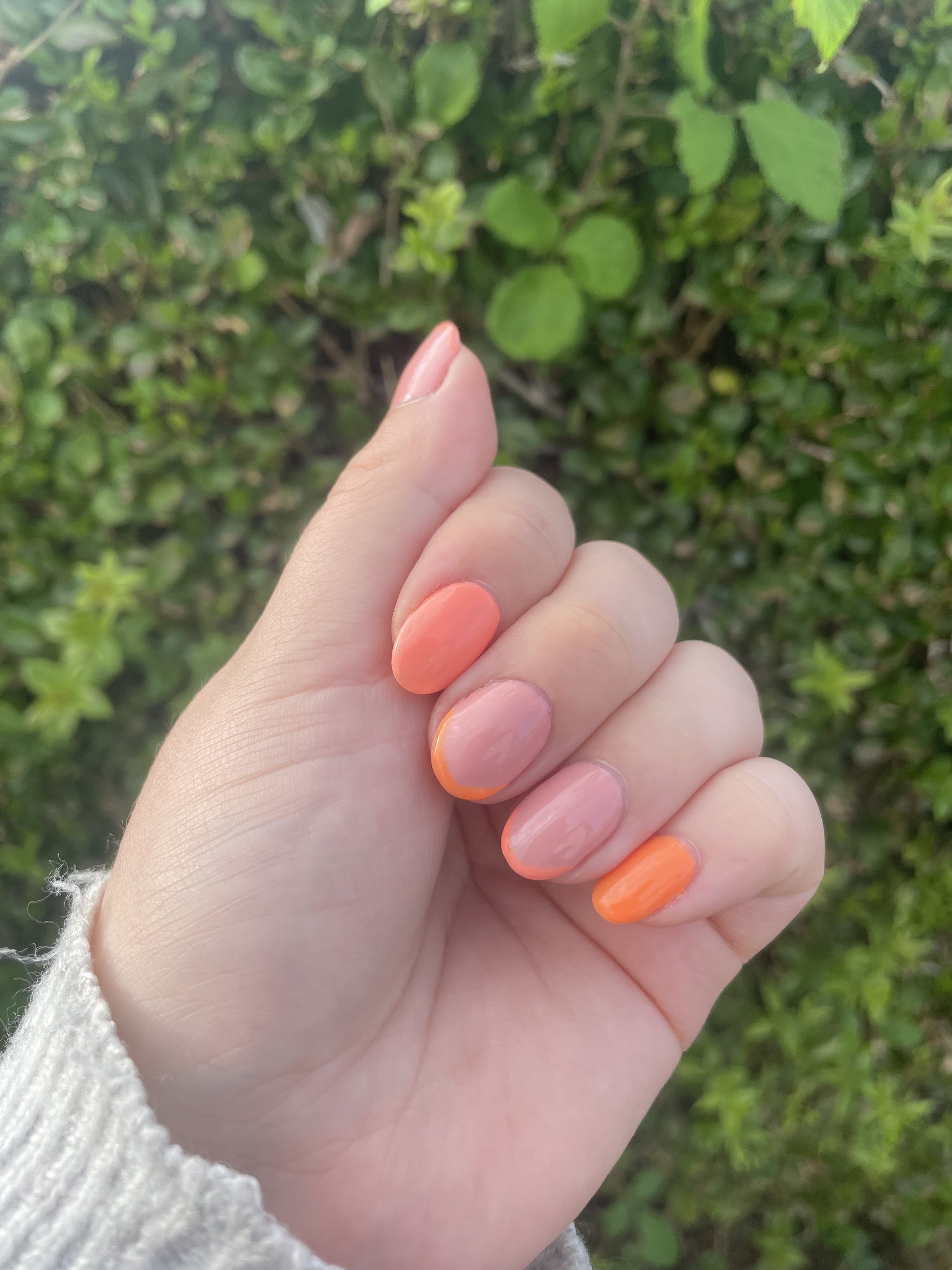 Peach and coral gel nails