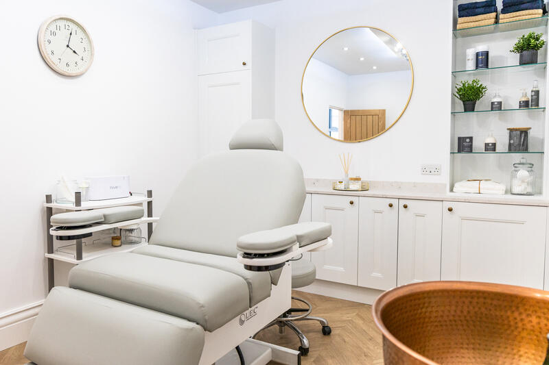 The pedicure chair with its copper foot spa